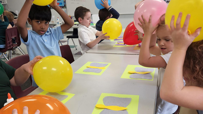 Paragon students with balloons