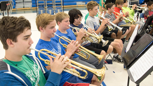 Students playing instruments