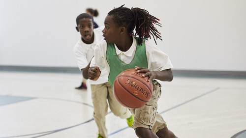 Students playing basketball