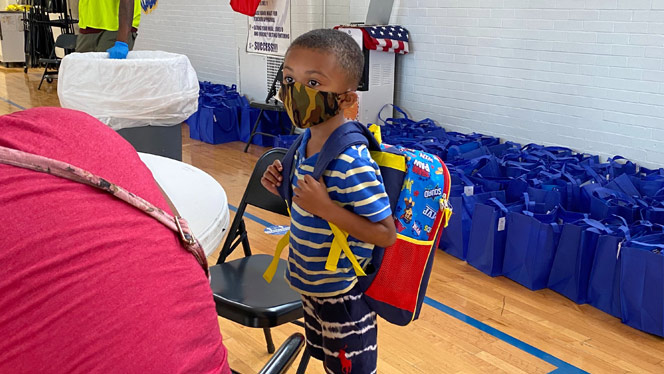 student wearing a backpack