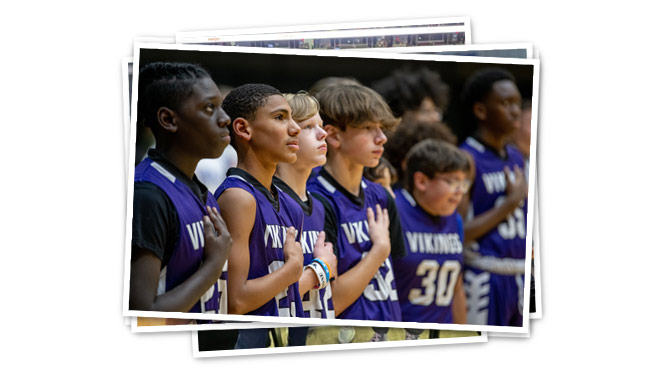 Vanguard players standing for National Anthem