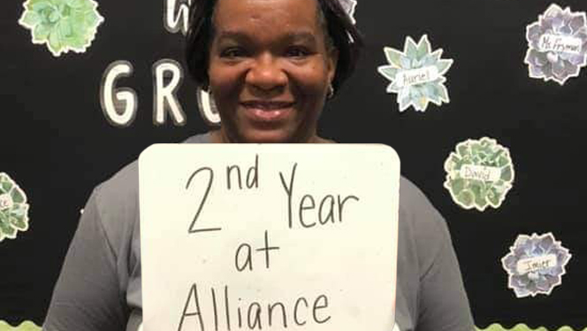Dean holding sign "2nd year."