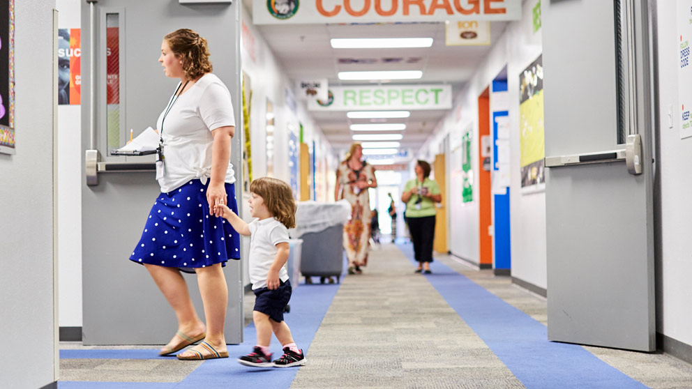 Teacher with young student
