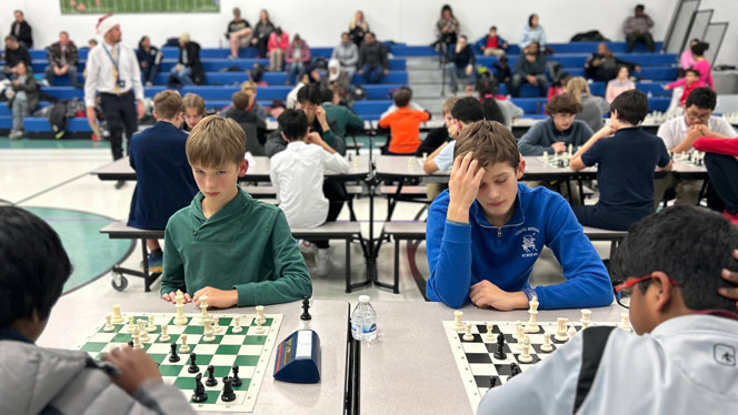 Students playing chess