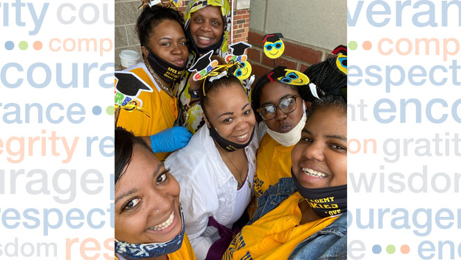 teachers taking a selfie with students