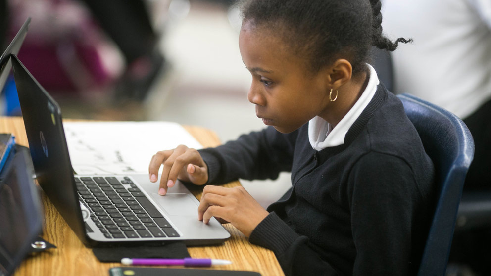 Student works on computer