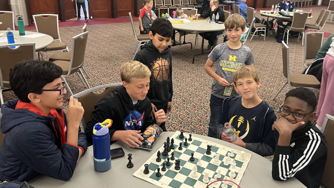 Students playing chess