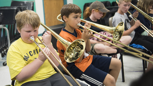 Students playing instruments