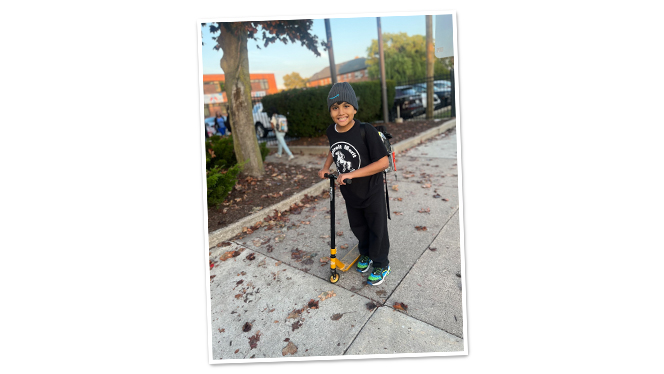 Student with scooter.