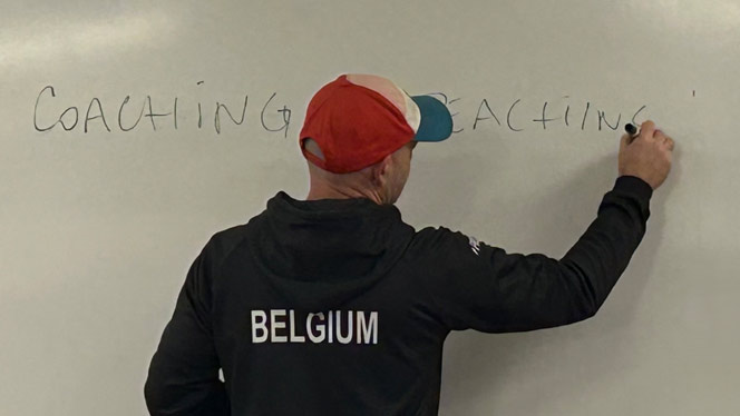 Iani writing on whiteboard.