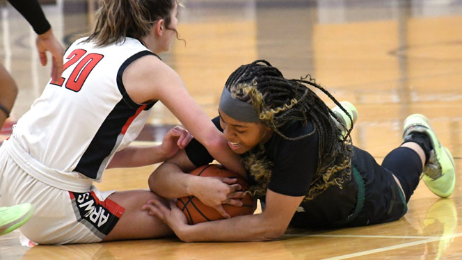 Stacy Utomi grapples for the ball