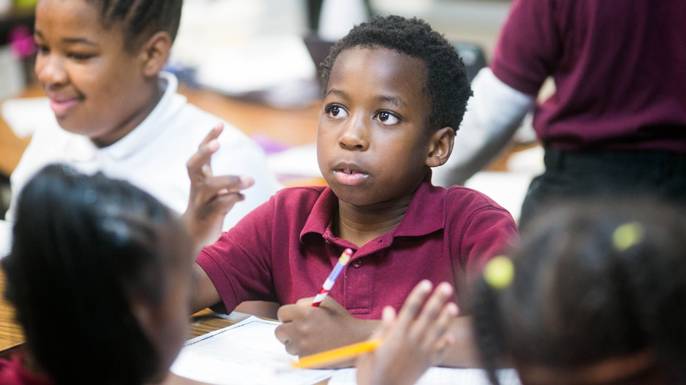 Boy listening in class