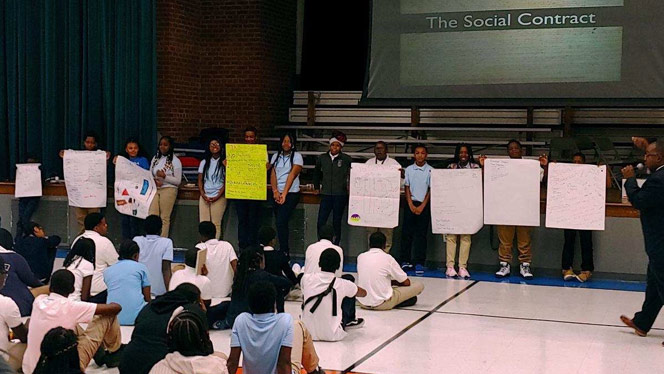 Students presenting on the social contract. Students presenting on the social contract.
