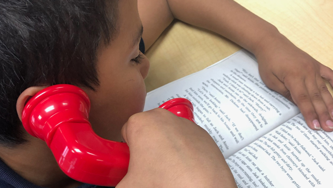 A student reading. A student reading.