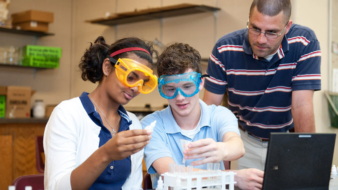 Students doing an experiment