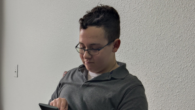 Student calculating price.