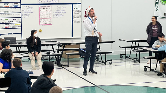 Teacher talking to students