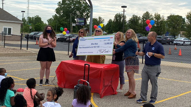 Representatives presenting the scholarship